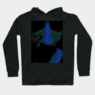 Portrait, digital collage and special processing. Close up to face, nose. Weird and dark. Green, blue reflexes. Hoodie